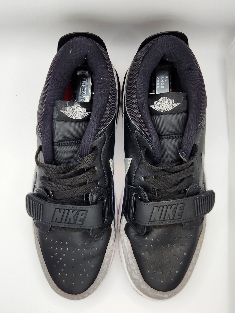 The Size 10 Air Jordan Legacy 312 Low Black Cement W is a stylish and athletic s